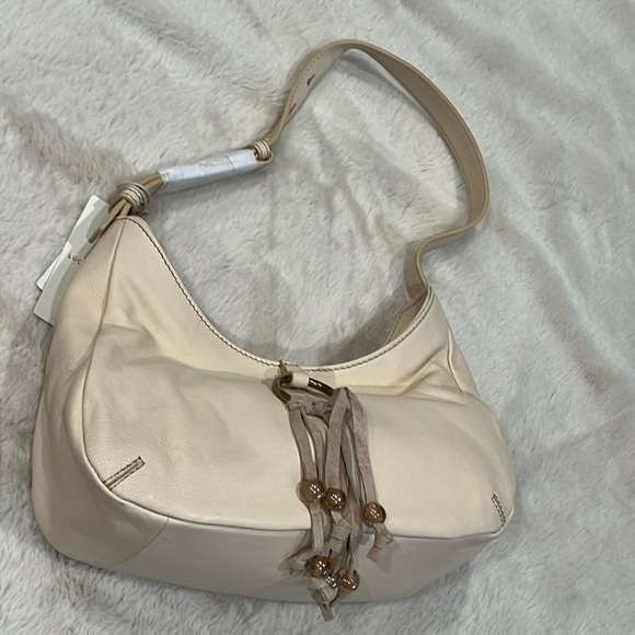 Lucky Brand Handbags - Lucky Brand tasseled bag/purse-NWT